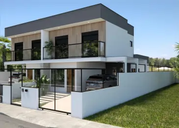 Fachada de sobrado com arquitetura contemporânea na Praia da Pinheira